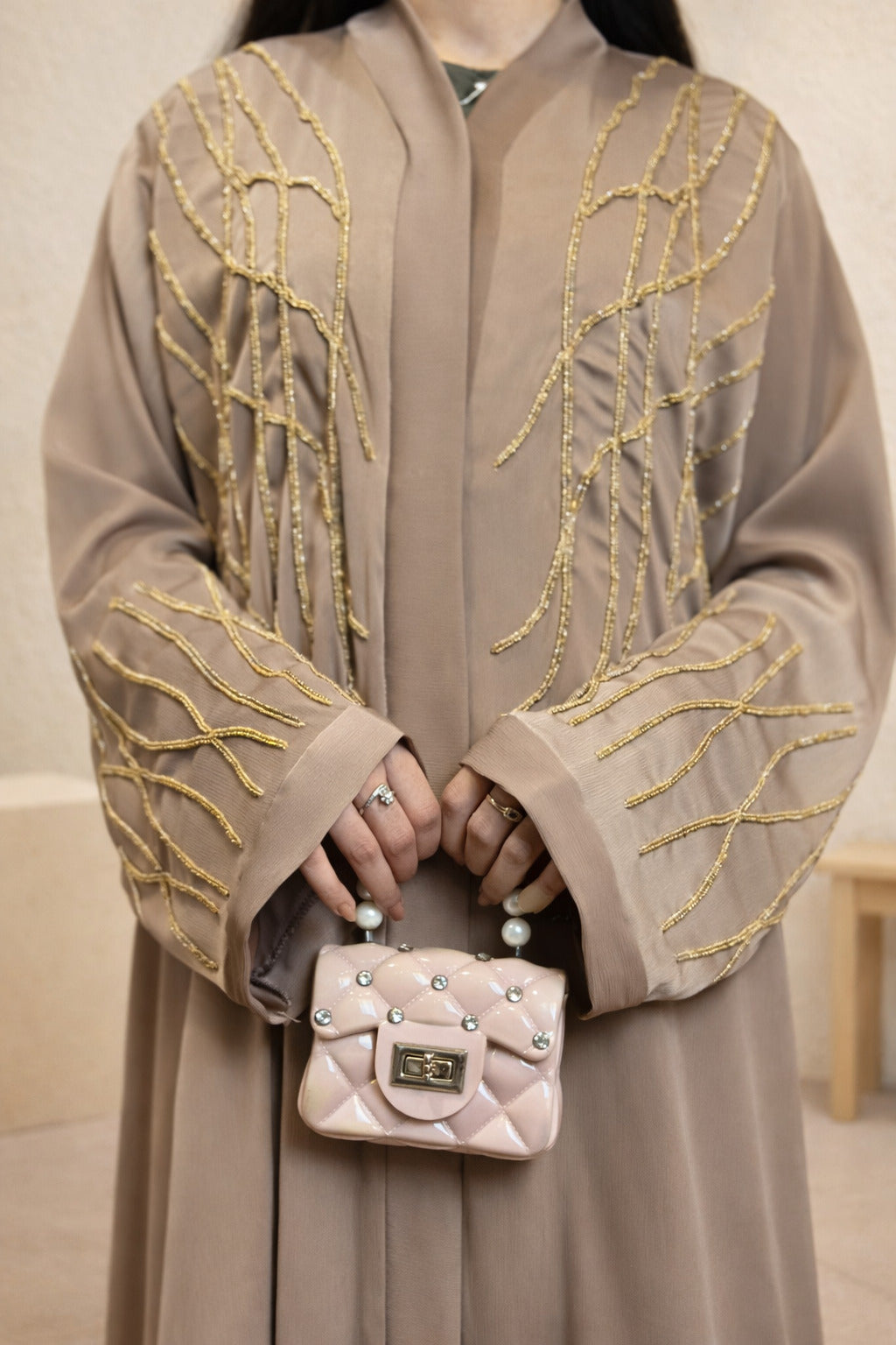 Anshara Sneaky Lines embroidered luxury abaya for women
