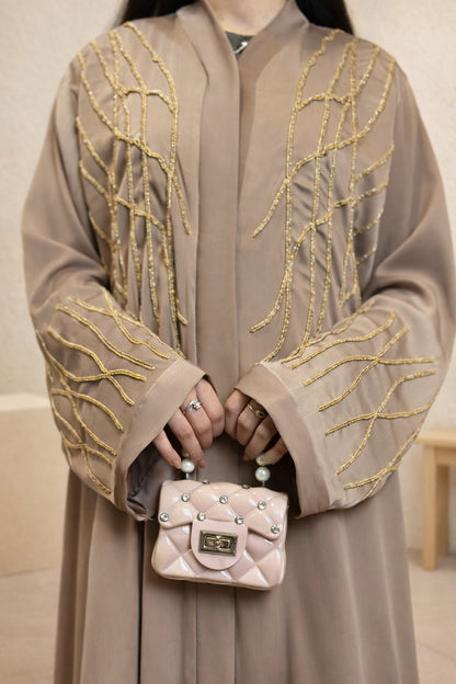 Anshara Sneaky Lines embroidered luxury abaya for women
