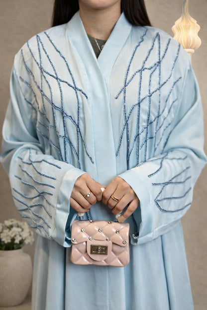 Anshara Sneaky Lines embroidered luxury abaya for women

